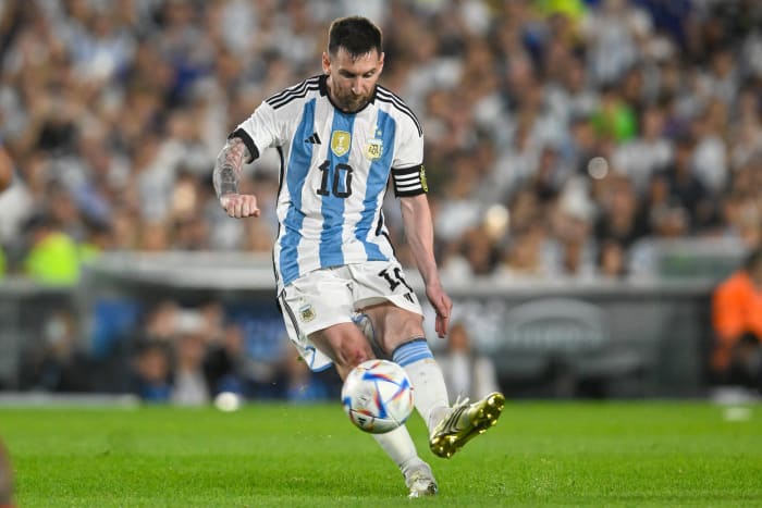 Lionel Messi pictured shooting to score direct from a free-kick during Argentina's 2-0 win over Panama in March 2023